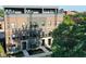 Three story brick building with rooftop decks and balconies at 559 Fulton St, Indianapolis, IN 46202