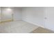 Spacious carpeted basement with an open floor plan and neutral walls at 6322 Loraine Dr, Brownsburg, IN 46112