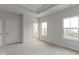 Bright bedroom with neutral walls and carpeting, access to bathroom at 6322 Loraine Dr, Brownsburg, IN 46112