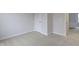 Spacious bedroom with carpet flooring and access to another room at 6322 Loraine Dr, Brownsburg, IN 46112