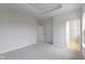 Spacious bedroom with neutral walls, carpeting and two doors at 6322 Loraine Dr, Brownsburg, IN 46112