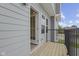 Private deck with wooden flooring and black railing at 6322 Loraine Dr, Brownsburg, IN 46112