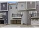 Modern townhouses with attached garages and private balconies at 6322 Loraine Dr, Brownsburg, IN 46112