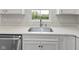 Modern kitchen sink and white cabinets at 6322 Loraine Dr, Brownsburg, IN 46112
