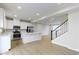 Open concept kitchen with white cabinets and island at 6322 Loraine Dr, Brownsburg, IN 46112