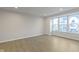 Living room with hardwood floors and a large bay window at 6322 Loraine Dr, Brownsburg, IN 46112