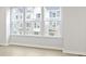 Spacious living area with large windows and hardwood floor at 6322 Loraine Dr, Brownsburg, IN 46112