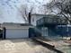 Back exterior view of home featuring a spacious deck, offering a perfect outdoor entertaining area at 810 Kendale Ct, Indianapolis, IN 46234