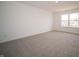 Bedroom featuring neutral walls and carpet, enhanced by natural light from a window at 8798 Walker St, Fortville, IN 46040