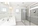 Bright bathroom featuring double sinks with a walk-in glass shower at 9217 Hawley Dr, Indianapolis, IN 46216