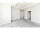 Spacious bedroom with neutral carpet and multiple doors at 9217 Hawley Dr, Indianapolis, IN 46216