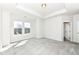 Bright bedroom with neutral carpet, recessed lights and windows providing natural light at 9217 Hawley Dr, Indianapolis, IN 46216