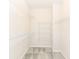 Walk in closet with carpet and white shelving at 9217 Hawley Dr, Indianapolis, IN 46216