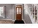 Entryway with wooden door and staircase at 10565 Camille Ct, Indianapolis, IN 46236