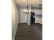 Dining area with chandelier and grey walls at 10915 Cherry Lake Pl, Indianapolis, IN 46235