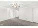 Spacious bedroom with carpeted floor and ceiling fan at 138 Fairway Dr, Indianapolis, IN 46260