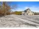 House exterior with snowy yard and trees at 138 Fairway Dr, Indianapolis, IN 46260