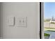 Home security key pad and light switches are conveniently located on the wall near the entrance at 19349 Sumrall Pl, Westfield, IN 46074