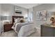 Comfortable bedroom features a plush bed, stylish decor, and soft natural light at 19373 Sumrall Pl, Westfield, IN 46074