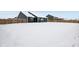 Large backyard covered in snow with a view of a house at 2364 Eagle Ave, Plainfield, IN 46168