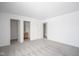 Bedroom with ensuite bathroom, walk-in closet, and neutral gray carpet at 3246 Tupelo Dr, Indianapolis, IN 46239