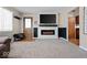 Living room with fireplace and built-in shelving at 3600 N Virginia Ave, Muncie, IN 47304