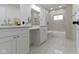 Stylish bathroom featuring a shower and tub combination, and updated vanities at 3838 Winthrop Ave, Indianapolis, IN 46205