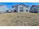 Exterior of home featuring a large backyard with a fence and sliding glass door at 4061 Omaha Dr, Bargersville, IN 46106