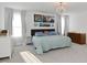Spacious Primary bedroom featuring a king bed and large windows at 4061 Omaha Dr, Bargersville, IN 46106