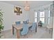 Elegant dining room featuring a rustic table and chandelier at 4061 Omaha Dr, Bargersville, IN 46106