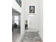 Bright entryway with tile flooring and modern art at 4061 Omaha Dr, Bargersville, IN 46106