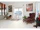 Relaxing living room with a leather chair and large window at 4061 Omaha Dr, Bargersville, IN 46106
