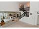 Open-concept floorplan featuring a modern kitchen, spacious living area, and staircase at 4061 Omaha Dr, Bargersville, IN 46106
