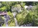 Aerial view showing the home's backyard, shed and surrounding trees at 475 Golf Ln, Indianapolis, IN 46260