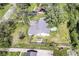 Aerial view of the home showcasing the large, private backyard and shed at 475 Golf Ln, Indianapolis, IN 46260