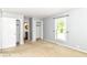 Inviting bedroom with a window, convenient access to the bathroom and closet, perfect for a comfortable living experience at 475 Golf Ln, Indianapolis, IN 46260
