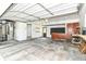 Spacious garage with overhead door, workbench, and ample storage space at 475 Golf Ln, Indianapolis, IN 46260