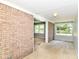 Living room with large windows for natural light at 475 Golf Ln, Indianapolis, IN 46260
