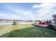 Backyard with patio, firepit and pond view at 5328 Covington Ave, McCordsville, IN 46055