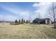 Landscaped backyard with mature trees and open space at 5328 Covington Ave, McCordsville, IN 46055