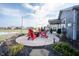 Spacious backyard patio with fire pit and seating area, perfect for outdoor entertaining at 5328 Covington Ave, McCordsville, IN 46055