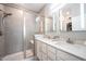 Modern bathroom with double vanity, quartz countertop, and large shower at 5328 Covington Ave, McCordsville, IN 46055