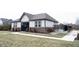 Community pool house with access gate and surrounding landscaping at 5328 Covington Ave, McCordsville, IN 46055