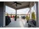 Covered patio with seating and a pond view at 5328 Covington Ave, McCordsville, IN 46055