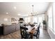 Open concept dining room with hardwood floors and view of living room at 5328 Covington Ave, McCordsville, IN 46055