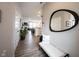 Open entryway with view into living area and bench at 5328 Covington Ave, McCordsville, IN 46055