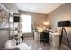 Bright home office featuring a large desk and comfortable chair at 5328 Covington Ave, McCordsville, IN 46055