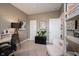 Spacious home office with built-in shelving and comfortable seating at 5328 Covington Ave, McCordsville, IN 46055