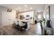 Modern kitchen with white cabinets, stainless steel appliances, and island at 5328 Covington Ave, McCordsville, IN 46055