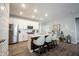 Modern kitchen with white cabinets, stainless steel appliances, and island at 5328 Covington Ave, McCordsville, IN 46055